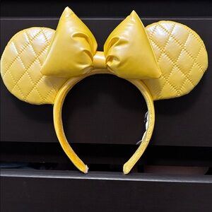 Yellow Disney Minnie Mouse headband.